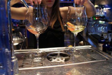 The gin is poured over the spices