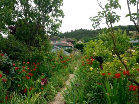 Monet's House peeking through the immense gardens